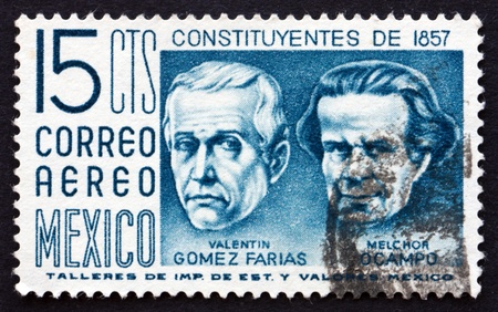 MEXICO - CIRCA 1956: a stamp printed in the Mexico shows Valentin Gomez Farias and Melchor Ocampo, Centenary of the Constitution, circa 1956のeditorial素材