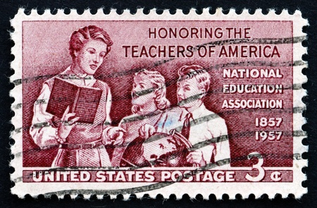 UNITED STATES OF AMERICA - CIRCA 1957: a stamp printed in the USA shows Teacher and Pupils, Honoring...