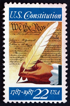 UNITED STATES OF AMERICA - CIRCA 1987: a stamp printed in the USA shows Hand with Quill Pen, Signing...