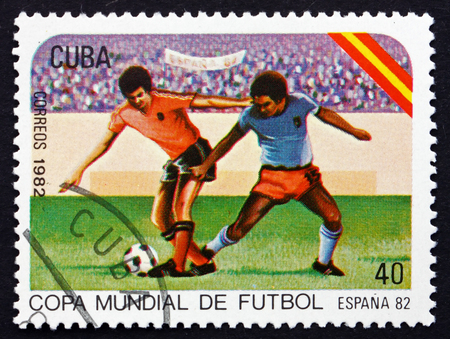 CUBA - CIRCA 1982: a stamp printed in the Cuba shows Soccer Players in Action, 1982 World Cup Soccer Championships, Spain, circa 1982のeditorial素材