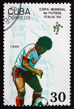 CUBA - CIRCA 1990: a stamp printed in the Cuba shows Soccer Players in Action, Dribbling, 1982 World Cup Soccer Championships, Italy, circa 1990のeditorial素材