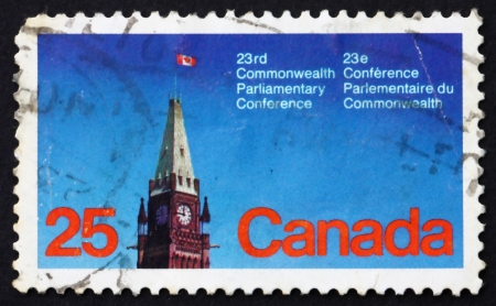 CANADA - CIRCA 1977: a stamp printed in the Canada shows Peace Tower, Parliament, Ottawa, 23rd Commonwealth Parliamentary Conference, Ottawa, circa 1977のeditorial素材