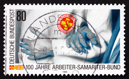 GERMANY - CIRCA 1988: a stamp printed in the Germany shows Samaritan Association of Workers (ASB) Rescue Service, Centenary, circa 1988のeditorial素材