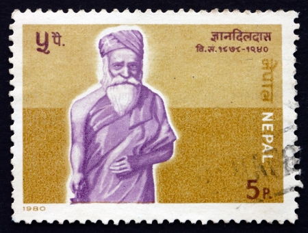 NEPAL - CIRCA 1980: a stamp printed in the Nepal shows Gyandil Das, Nepalese Writer, circa 1980のeditorial素材