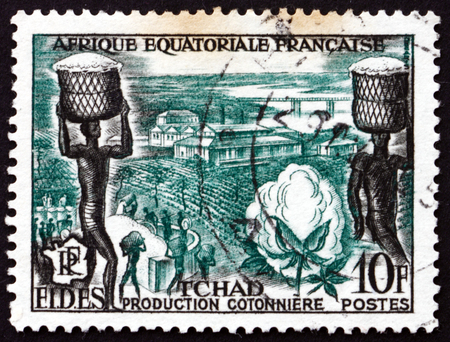 CHAD - CIRCA 1956: a stamp printed in Chad, French Equatorial Africa, shows Cotton, circa 1956のeditorial素材
