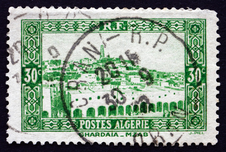 ALGERIA - CIRCA 1936: a stamp printed in Algeria shows View of Ghardaia, City, circa 1936のeditorial素材