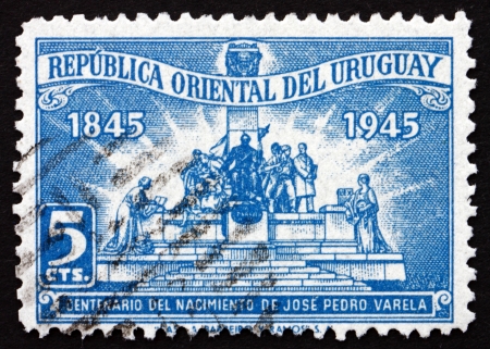 URUGUAY - CIRCA 1945: a stamp printed in the Uruguay shows Monument to Jose Pedro Varela, Author, circa 1945のeditorial素材