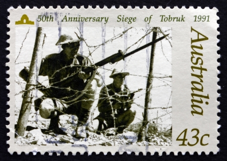 AUSTRALIA - CIRCA 1991: a stamp printed in the Australia shows Siege of Tobruk, World War II, 50th Anniversary, circa 1991のeditorial素材