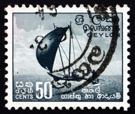 SRI LANKA - CIRCA 1954: a stamp printed in Sri Lanka shows Outrigger Fishing Canoe, circa 1954のeditorial素材