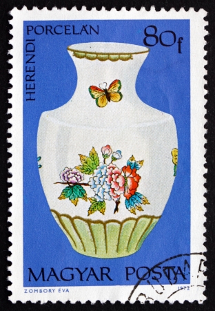 HUNGARY - CIRCA 1972: a stamp printed in the Hungary shows Vase vith Flowers and Butterflies, Herend Porcelain, Herend China Factory, Founded 1839, circa 1972のeditorial素材