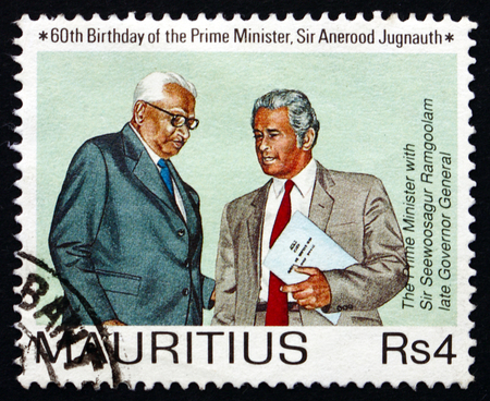 MAURITIUS - CIRCA 1990: a stamp printed in the Mauritius shows Prime Minister Jugnauth and Governor-General Ramgoolam, circa 1990のeditorial素材