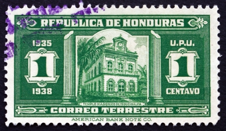 HONDURAS - CIRCA 1935: a stamp printed in Honduras shows Masonic Temple, Tegucigalpa, circa 1935のeditorial素材