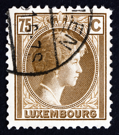LUXEMBOURG - CIRCA 1927: a stamp printed in the Luxembourg shows Charlotte, Grand Duchess of Luxembourg, Reign from 1919 to 1964, circa 1927のeditorial素材