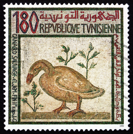 TUNISIA - CIRCA 1992: a stamp printed in Tunisia shows Duck, Mosaic, circa 1992のeditorial素材