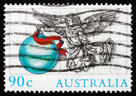 AUSTRALIA - CIRCA 1985: a stamp printed in the Australia shows Angel with Ornament, Illustration by...
