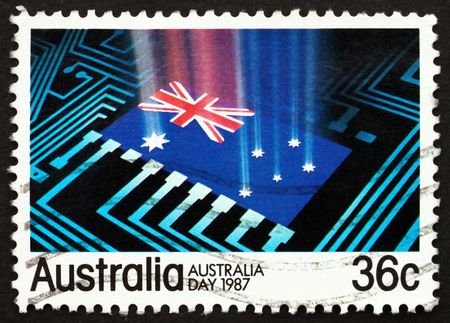 AUSTRALIA - CIRCA 1987: a stamp printed in the Australia shows National Flag, Circuit Board, Australia Day, circa 1987のeditorial素材