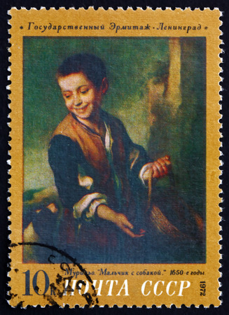RUSSIA - CIRCA 1972: a stamp printed in the Russia shows Boy with Dog, Painting by Bartolome Esteban Murillo, circa 1972のeditorial素材