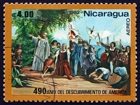 NICARAGUA - CIRCA 1982: a stamp printed in Nicaragua shows Landing of Columbus, Discovery of America, circa 1982のeditorial素材