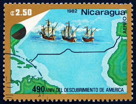 NICARAGUA - CIRCA 1982: a stamp printed in Nicaragua shows Trans-Atlantic Voyage, Discovery of America, circa 1982のeditorial素材