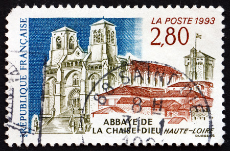 FRANCE - CIRCA 1993: a stamp printed in the France shows Chaise-Dieu Abbey, in the Haute-Loire Department, circa 1993のeditorial素材