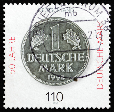 GERMANY - CIRCA 1998: a stamp printed in the Germany shows Deutsche Mark, 50th Anniversary, circa 1998のeditorial素材
