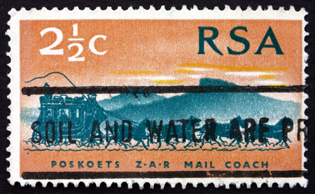 SOUTH AFRICA - CIRCA 1969: a stamp printed in South Africa shows Stagecoach of 1869, Centenary of South African Postage Stamps, circa 1969のeditorial素材