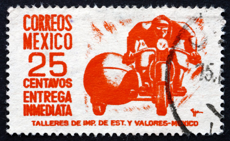 MEXICO - CIRCA 1950: a stamp printed in the Mexico shows Motorcycle, Special Delivery Messenger, circa 1950のeditorial素材