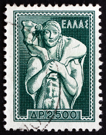 GREECE - CIRCA 1954: a stamp printed in the Greece shows Shepherd Carrying Calf, Moschophoros, the nearly Lifesize Marble Statue , of ca 570 BCE, Found on the Athenian Acropolis, circa 1954のeditorial素材