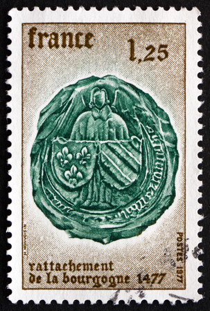 FRANCE - CIRCA 1977: a stamp printed in the France shows Arms of Burgundy, 500th Anniversary of the Annexation of Burgundy by the French Crown, circa 1977のeditorial素材