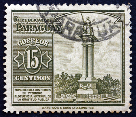 PARAGUAY - CIRCA 1946: a stamp printed in Paraguay shows Monument to Heroes of Itororo, Ypane, circa 1946のeditorial素材