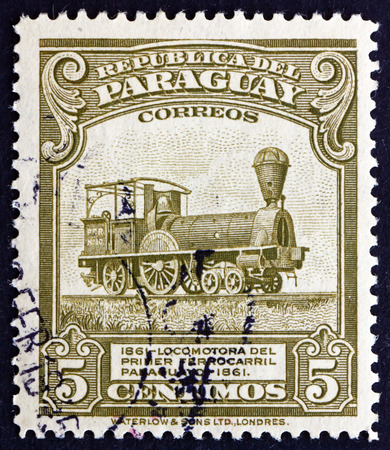 PARAGUAY - CIRCA 1944: a stamp printed in Paraguay shows Locomotive of early Paraguayan Railroad, circa 1944のeditorial素材