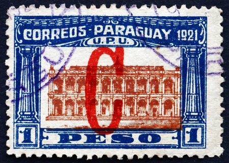 PARAGUAY - CIRCA 1922: a stamp printed in Paraguay shows Parliament Building, Asuncion, circa 1922のeditorial素材