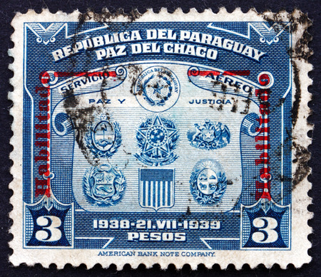 PARAGUAY - CIRCA 1939: a stamp printed in Paraguay shows Coat of Arms, First Buenos Aires Peace Conference, circa 1939のeditorial素材