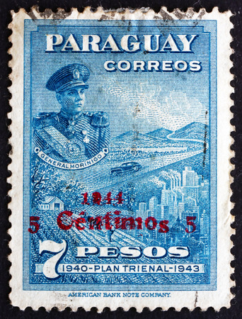 PARAGUAY - CIRCA 1944: a stamp printed in Paraguay shows President Higinio Morinigo, Scenes of Industry and Agriculture, circa 1944のeditorial素材