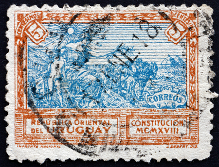 URUGUAY - CIRCA 1918: a stamp printed in the Uruguay shows Liberty Extending Peace to the Country, Promulgation of the Constitution, circa 1918のeditorial素材