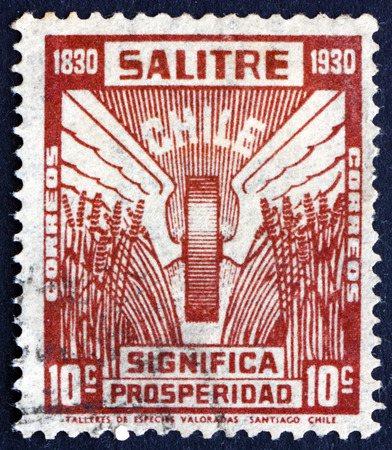 CHILE - CIRCA 1930: a stamp printed in the Chile shows Ears of Corn, Prosperity of Saltpeter Trade, circa 1930のeditorial素材