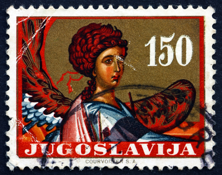 YUGOSLAVIA - CIRCA 1962: a stamp printed in the Yugoslavia shows Archangel Gabriel, Icon, 14th Centenary, circa 1962のeditorial素材