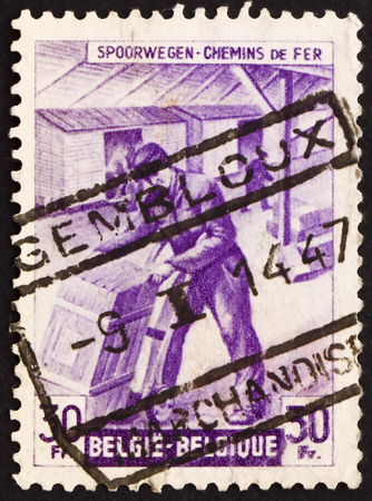 BELGIUM - CIRCA 1945: a stamp printed in the Belgium shows Freight Station Interior, circa 1945のeditorial素材