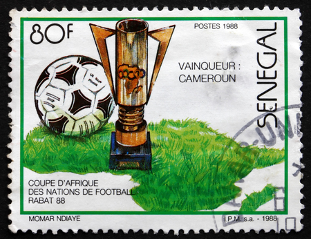 SENEGAL - CIRCA 1988: a stamp printed in Senegal shows Cameroun Winner, 1988 African Soccer Cup Championships, Rabat, circa 1988のeditorial素材