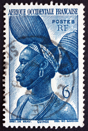 FRENCH WEST AFRICA - CIRCA 1947: a stamp printed in the France shows Fula Woman, French Guinea, circa 1947のeditorial素材