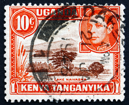 EAST AFRICAN POSTAL UNION - CIRCA 1941: a stamp printed in the East African Postal Union (Kenya, Uganda, Tanganyika) shows Lake Naivasha, circa 1941のeditorial素材