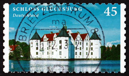 GERMANY - CIRCA 2013: a stamp printed in the Germany shows Glucksburg Castle, is a Water Castle in the Town of Glucksburg, Germany, circa 2013のeditorial素材