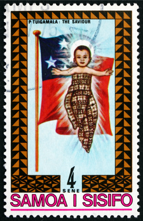 SAMOA - CIRCA 1975: a stamp printed in the Samoa shows Christ Child and Samoan Flag, Christmas, circa 1975のeditorial素材