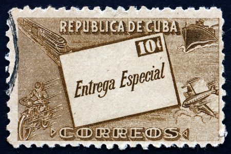 CUBA - CIRCA 1945: a stamp printed in the Cuba shows Letter and Symbols of Transportation, circa 1945のeditorial素材