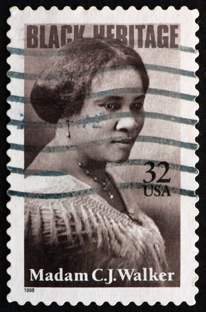 USA - CIRCA 1998: a stamp printed in the USA shows Madam C. J. Walker, Entrepreneur, Philanthropist, and the First Female, self-made Millionaire in America, Black Heritage, circa 1998のeditorial素材