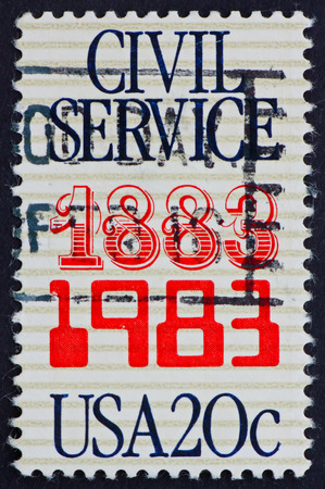 USA - CIRCA 1983: a stamp printed in the USA shows Civil Service, Anniversary, circa 1983のeditorial素材