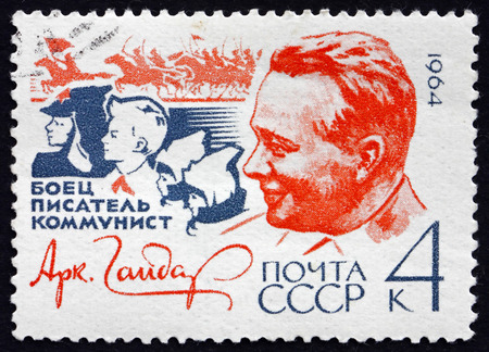 RUSSIA - CIRCA 1964: a stamp printed in the Russia shows Arkady Petrovich Golikov, known as Arkady Gaidar, Soviet writer very popular among Soviet children, circa 1964のeditorial素材