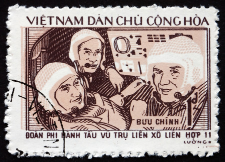 VIETNAM - CIRCA 1972: a stamp printed in Vietnam shows Soyuz 11 Cosmonauts, circa 1972のeditorial素材