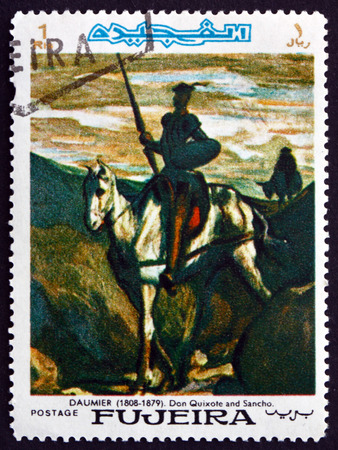 FUJEIRA - CIRCA 1967: a stamp printed in the Fujeira shows Don Quixote and Sancho Panza, Painting by Honore Daumier, French Artist and Painter, circa 1967のeditorial素材