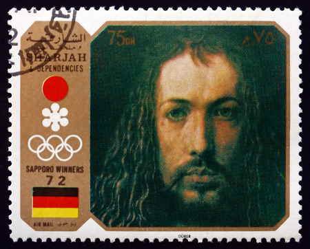 SHARJAH - CIRCA 1972: a stamp printed in the Sharjah UAE shows Self-portrait, Painting by Albrecht Durer, German Painter, Printmaker and Mathematician, circa 1972のeditorial素材